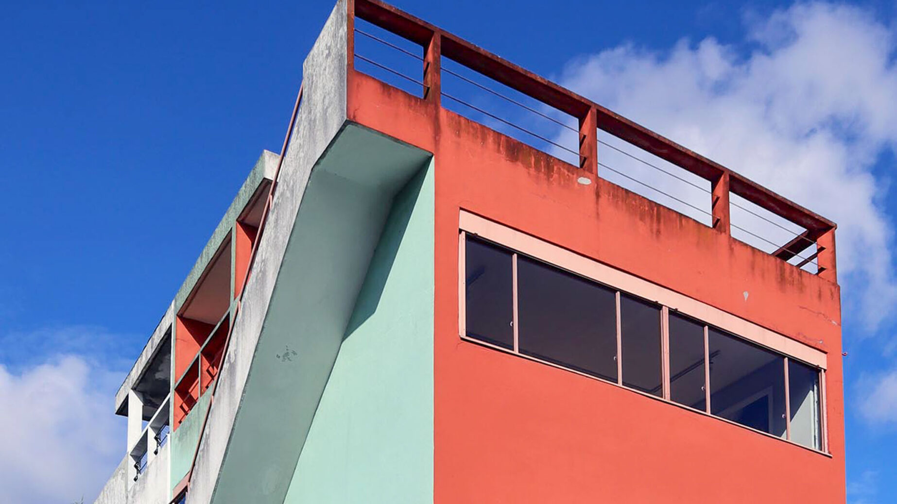 Jade-green housing estate, horizon-blue world heritage site